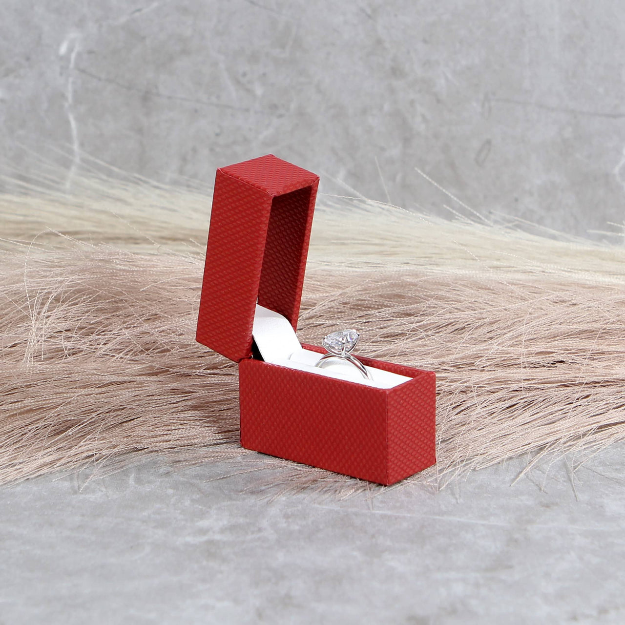 Discreet red ring box for proposals