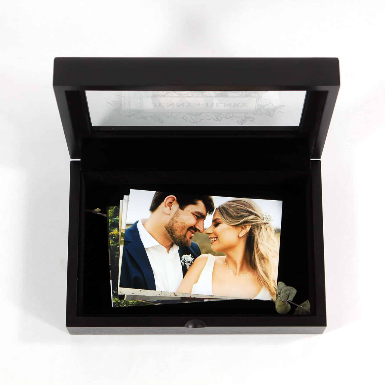 wedding keepsake storage box made from black wood with a velvet inner lining, holds photographs, memories, flowers, table settings, wedding momentos