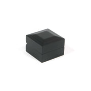 black wedding ring box made of wood and velvet with the lid closed