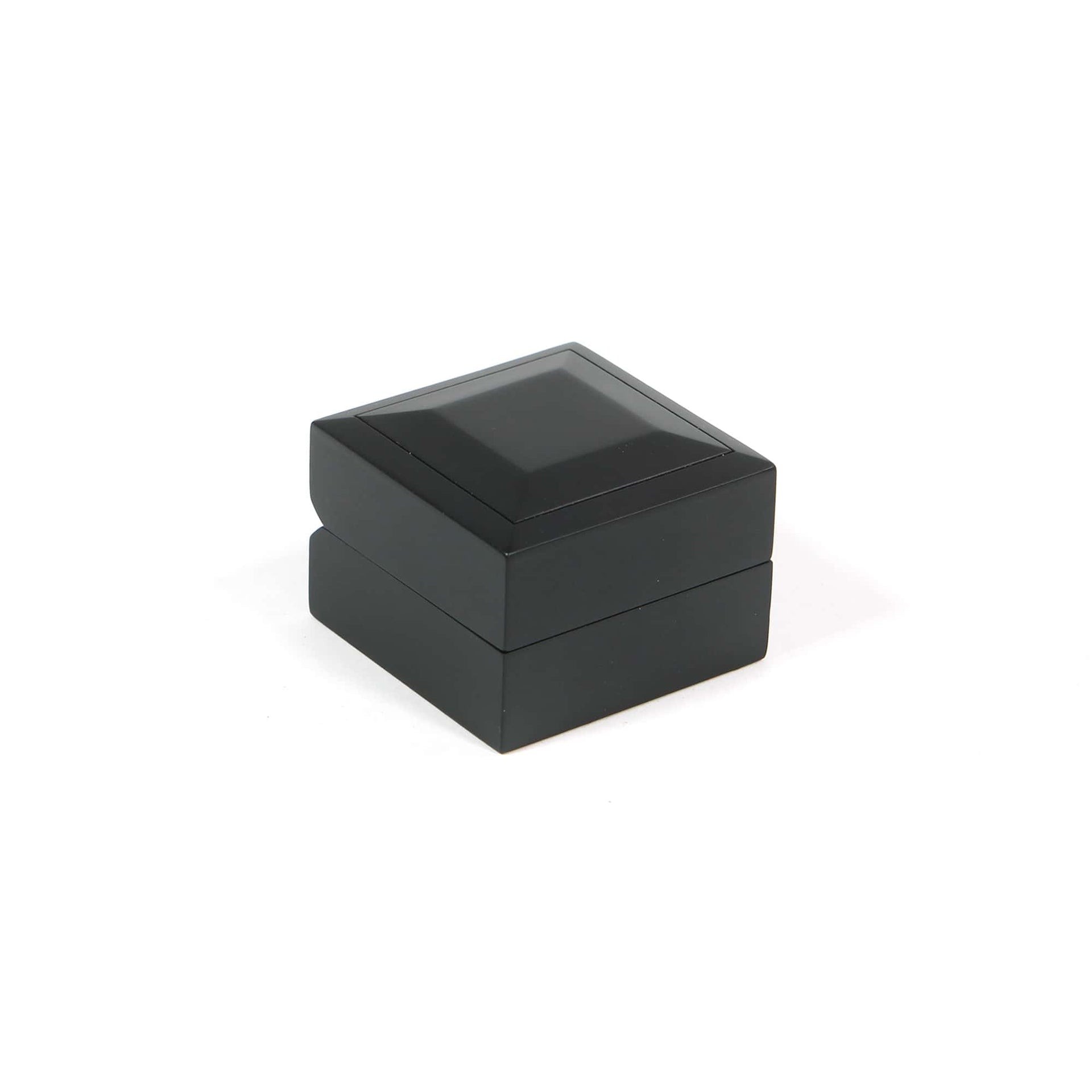 black wedding ring box made of wood and velvet with the lid closed