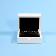 Luxury gloss white ring box for engagements, ,proposals, weddings and more. Velvet interior ensures the protection of your gems! The perfect modern ring box for your special day. This modern ring box can hold up to two rings.