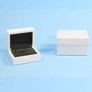 Luxury gloss white ring box for engagements, ,proposals, weddings and more. Velvet interior ensures the protection of your gems! The perfect modern ring box for your special day. This modern ring box can hold up to two rings.