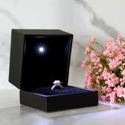This is a large black led ring box that has a built in led light pointed down at the ring. Great for weddings, proposals, ,engagements or just to show off your gems! Proposal ring box with light, red ring box, engagement ring box with LED