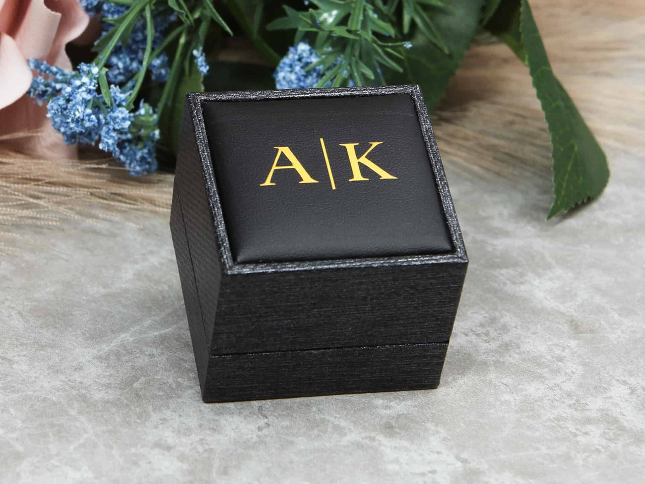 Custom monogram ringbox with gold initial letters 