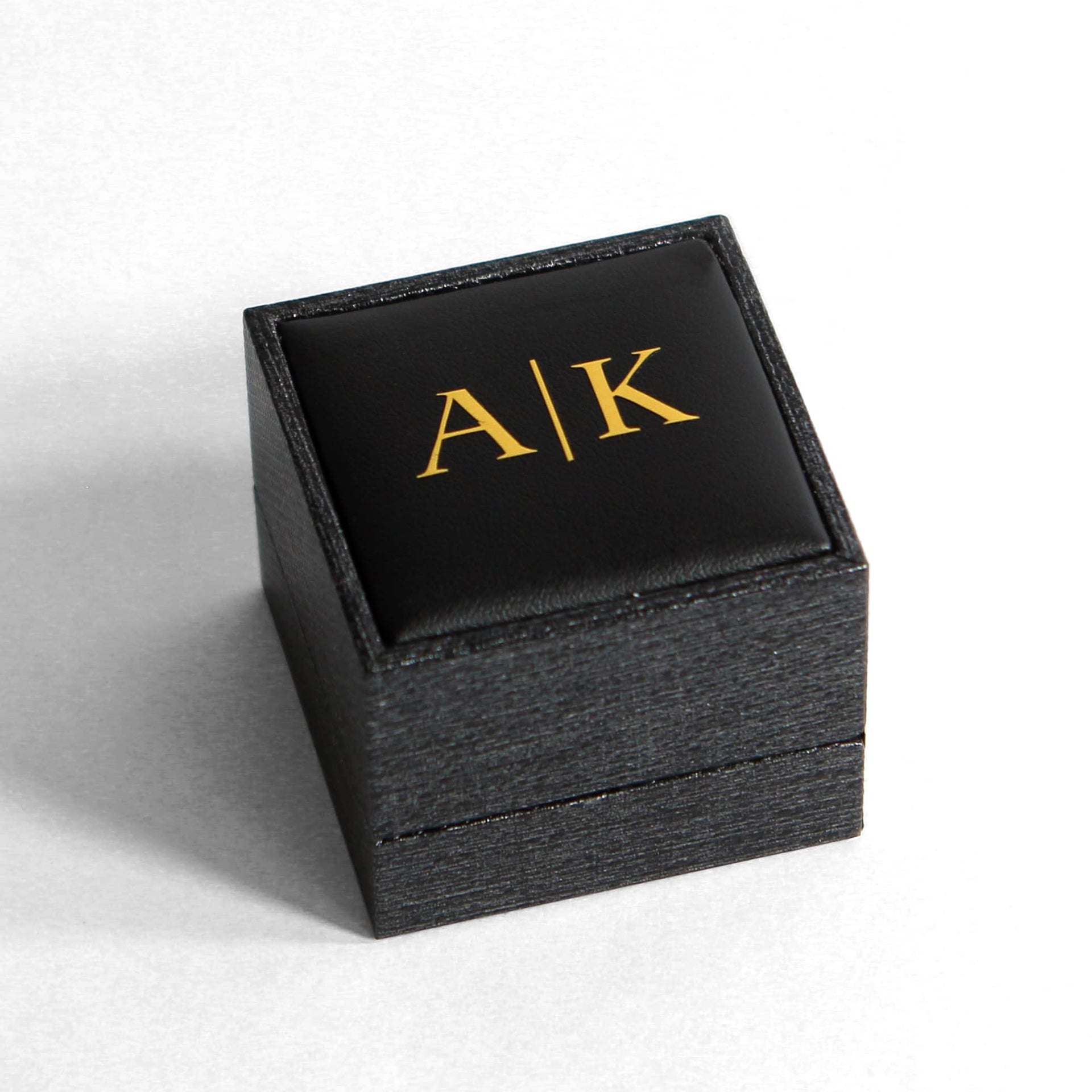 custom engagement ring box with gold letter monogram 
