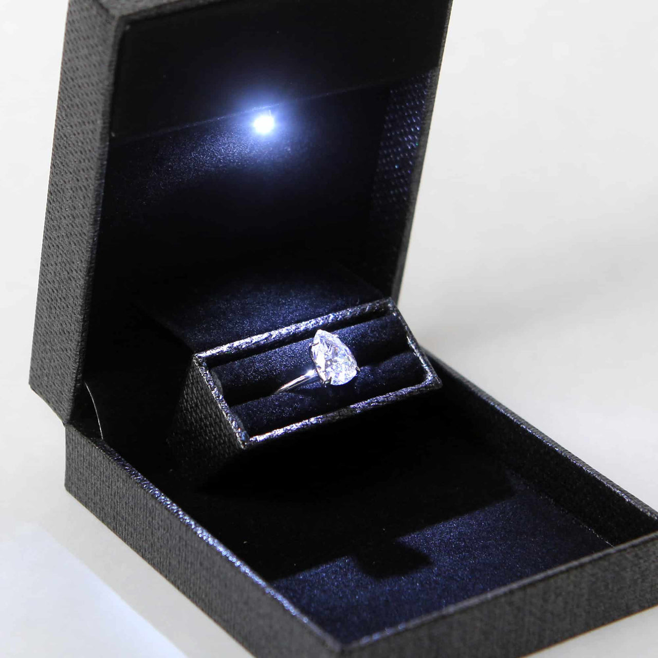 discreet slim proposal ring box with light that fits large pear shaped diamond ring