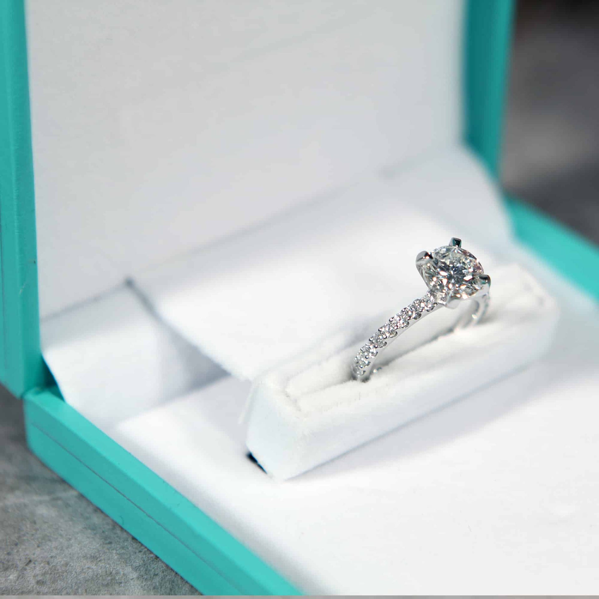 diamond engagement ring in slim ring box
