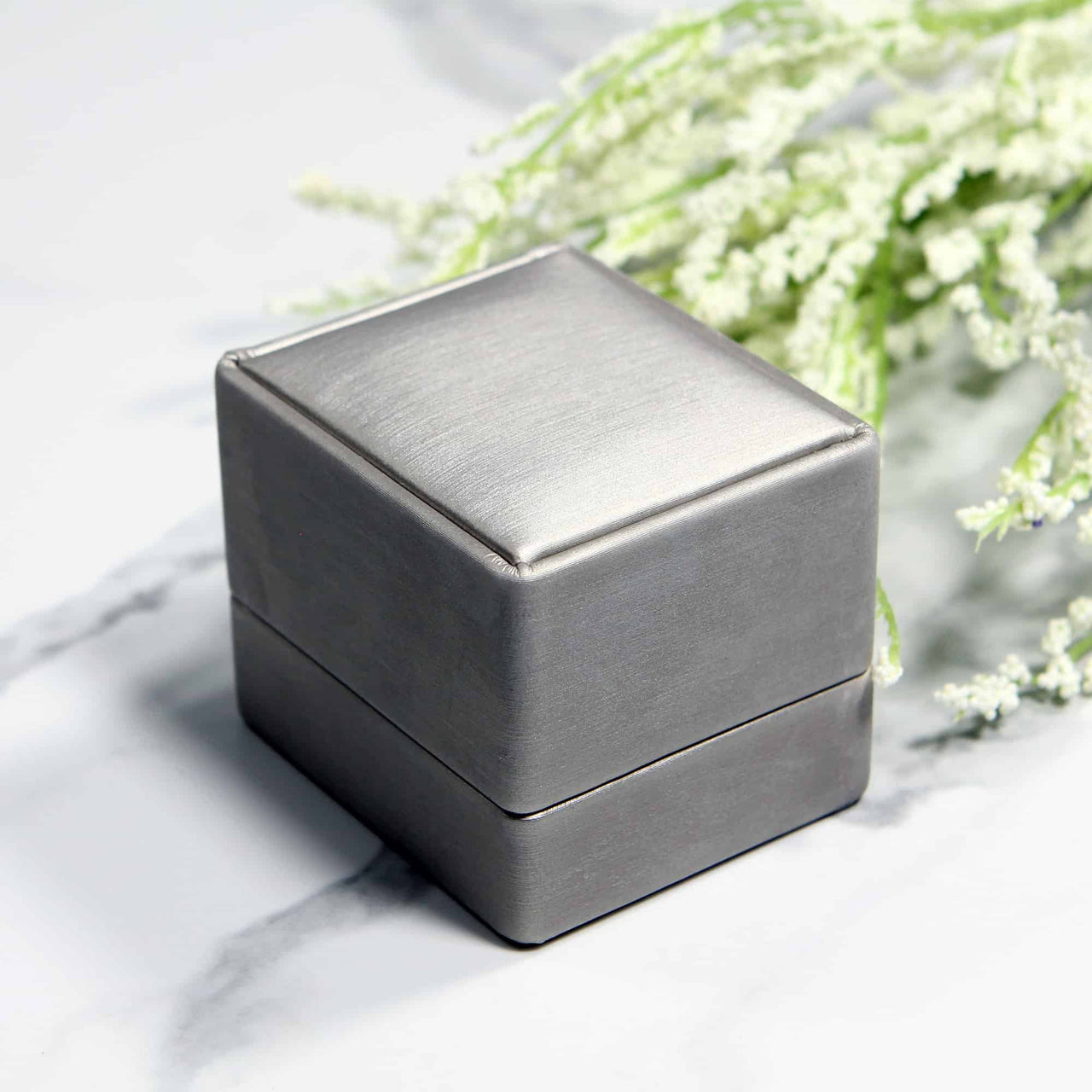 luxury champagne ring box with a modern look