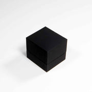 black proposal ring box on white background