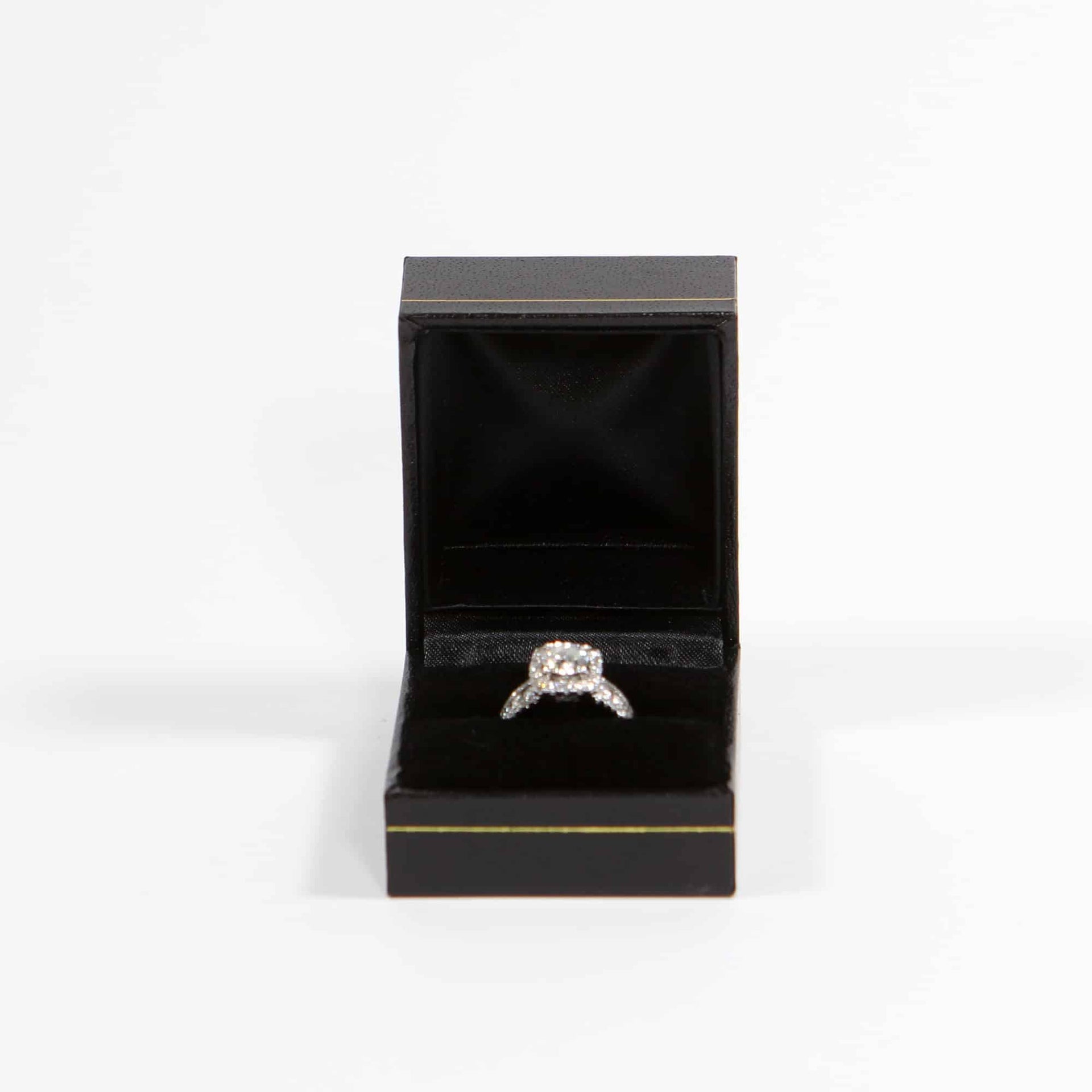 Black ring box with gold design. Perfect for your special wedding day