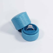 blue wedding ring box on white background 