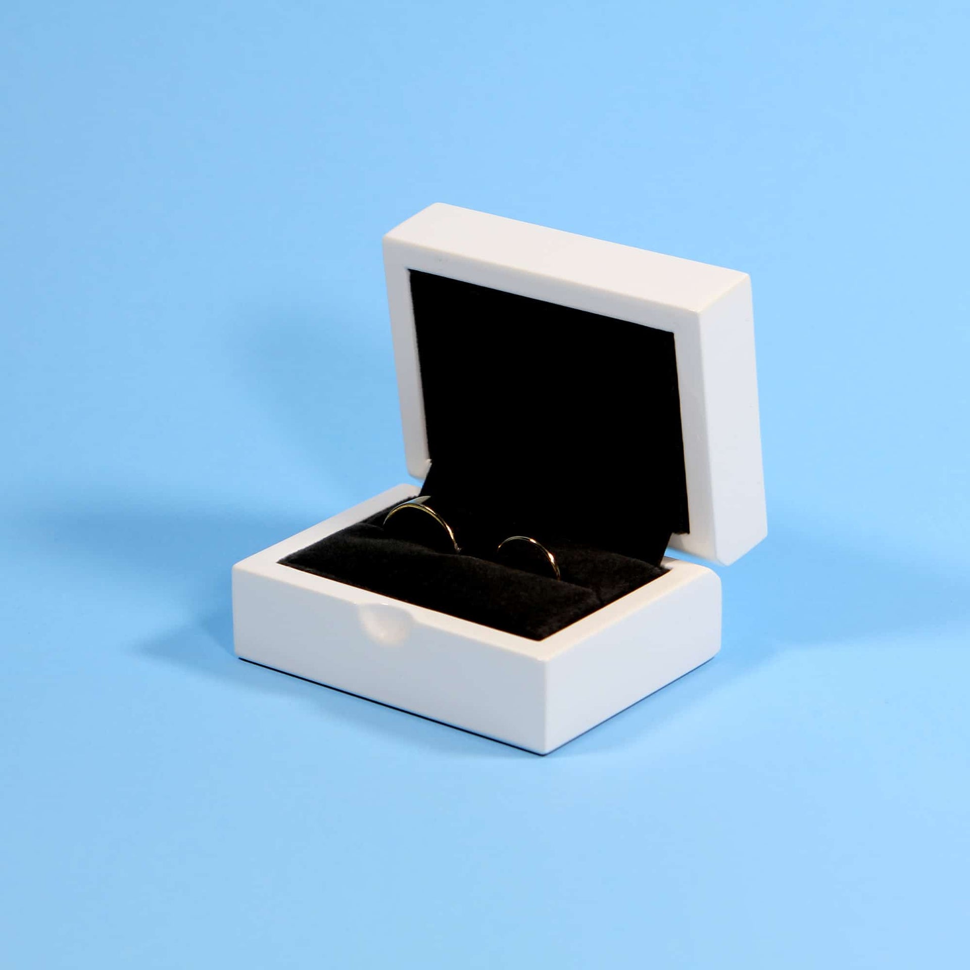 Luxury gloss white ring box for engagements, ,proposals, weddings and more. Velvet interior ensures the protection of your gems! The perfect modern ring box for your special day. This modern ring box can hold up to two rings.